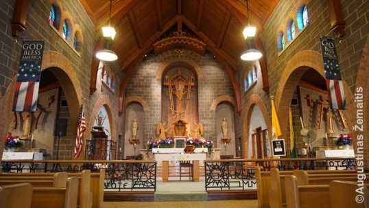 The interior of the church with a Lithuanian-folk-woodcarving altar