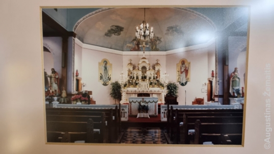 An image of Sioux City Lithuanian church interior from the Trinity Heights. The two paintings by Valeška that have been saved here are visible in this image on the both sides of the altar