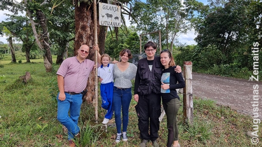 'Global True Lithuania' authors and Slotkus family at the Granja Lituania sign